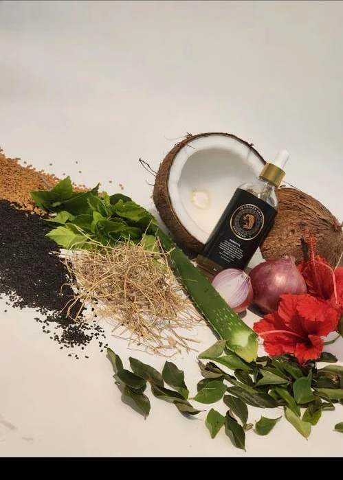 VR Golden scalp oil arranged with botanical ingredients